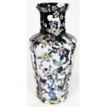 A 20thC Chinese porcelain famille noire lobed baluster vase, decorated with birds amoung flowering p