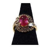 A ruby and diamond dress ring, with central oval cut ruby, in four claw setting, surrounded by two r