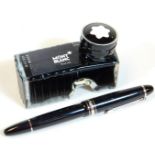 A Mont Blanc fountain pen, in black with chrome coloured banding and star set to the lid, marked two