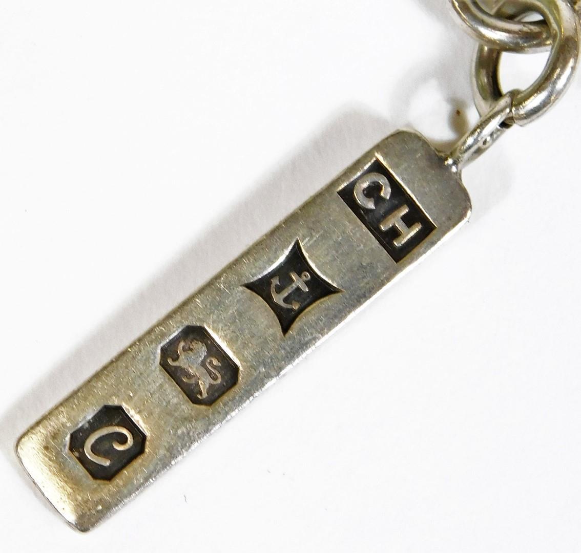 A silver ingot, Birmingham 1977, attached to an unmarked bracelet and a silver plated open faced poc - Image 2 of 3