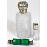 A Victorian cut glass and silver mounted scent bottle, 16cm H, decorated with embossed C scrolls, ro