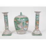 Various 20thC Chinese pottery, comprising a pair of candlesticks and lidded jar, each decorated with