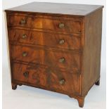 An early 19thC mahogany chest commode, with hinged centre, vacant interior and stylized splayed feet