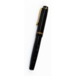 An Osmia Saber Castell fountain pen, in black with double banding and shaped clip, named nib, 13cm W