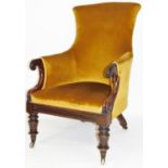 A 19thC mahogany library chair, with inverted back and shaped seat upholstered in (later) gold mater