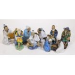 Various oriental glazed pottery figures, of elderly gentleman, etc. one playing musical instrument,