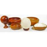 Various treen, etc. an apprentice type piece of a polished orb on stand, 19cm H, a hollowed ostrich