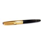An Aurora 88 fountain pen, marked 88p, in black with chrome coloured banding, gilt coloured clip and
