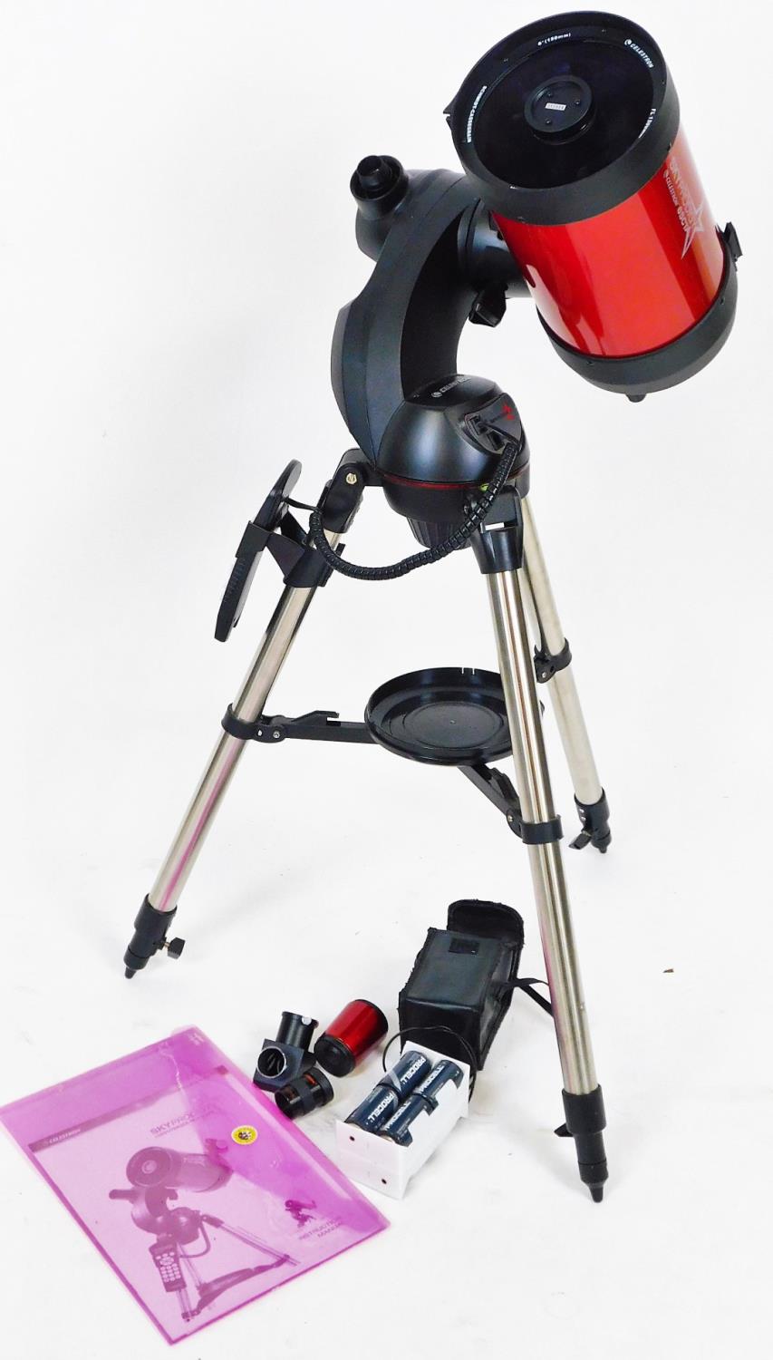 A SkyProdigy Celestron computerised telescope, with tripod, 70cm H when closed, main section and oth