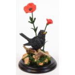 A Country Artists figure group Malvern Blackbird Poppies, CA698, 21cm H.