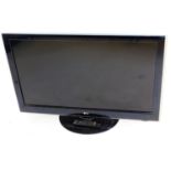 A LG 47 inch flatscreen colour television, in black trim with wire and remote control.