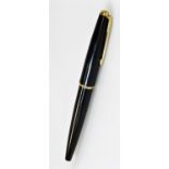 A Parker 50 fountain pen, in black with gilt banding and arrow clip, with gilt coloured section to t