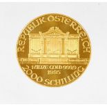 A 1995 Austrian gold Philharmonic coin, marked 1 unze gold, 999.9, 2000 Schilling.