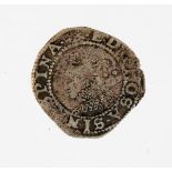 An Elizabeth I hammered silver penny, with long cross over coat of arms, crowned bust facing left, 1