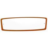 A G-Plan style teak mirror, of shaped form, with plain glass, 30cm H, 95cm W, 4cm D.