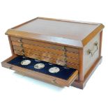 A silver Genius of Leonardo Da Vinci cased medallion set, comprising fifty medallions with paperwork