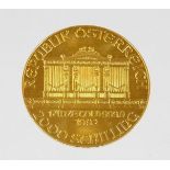 A 1992 Austrian gold Philharmonic coin, marked 1 unze gold, 999.9, 2000 Schilling.