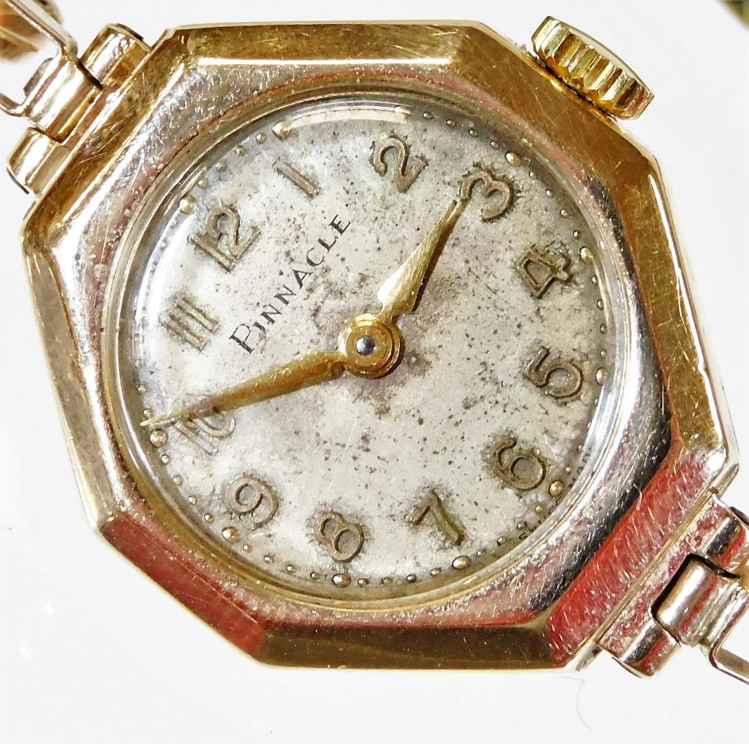 A 9ct gold Pinnacle ladies wristwatch, with octagonal watch head, on a silvered circular dial, on ex - Image 2 of 2