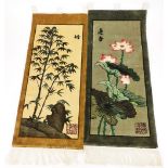 Two 20thC oriental material wall hangings, decorated with flowers, scenes and bamboo, signed with se