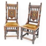 A pair of late 19thC Gillows Aesthetic style oak stained thrones, each with heavy backs, a repeat ca