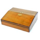 A Victorian olive and ebony writing box, the sloped hinged top enclosing a velvet lined interior and