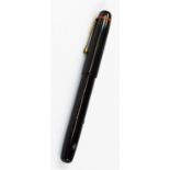 An Esterbrook relief No 2-L fountain pen, in black and gilt colours with flush and shaped clips, n