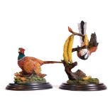A Country Artists figure group Bird on Branch, 20cm H, and another Pheasant, CA701. (2)