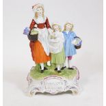 A 19thC Yardley Lavender Soap advertising figure group, of a lady aside two children, on a naturalis