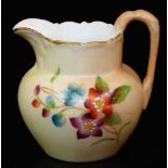 A Royal Worcester blush ivory ewer, decorated with flower sprays, shape code G1022, marked M Mature