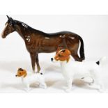 Three Beswick animals, a large Jack Russell Terrier, a small Jack Russell and a brown horse. (3)