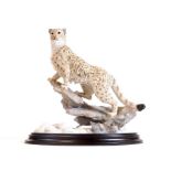 A Country Artists figure group Nature Trail Snow Leopard, CA751, 21cm H.