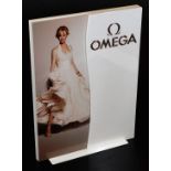 A tabletop Omega shop plaque display, 43cm x 33cm.