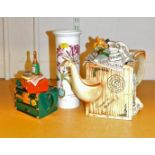 A Portmeirion vase, teapot and another. (3)
