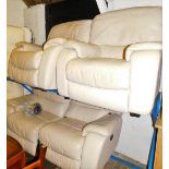 A cream leather electric reclining three piece suite.