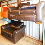 A two piece leather finish suite, comprising two seater settee and armchair and a brown leather type