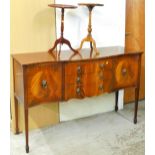 A mahogany wine table, tripod table and a serpentine sideboard.