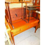 A side table, an oak desk and kitchen island.