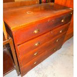 A stained pine chest of four long drawers.