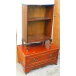 A mahogany finish serpentine bookcase and a TV stand.