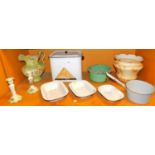 An enamel ware bread bin, pan, dishes, chamber pot, pottery jardiniere, jug and two candlesticks. (