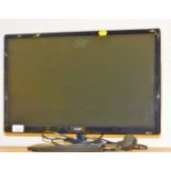 A Logik 21" colour TV in black trim with remote control and wire.