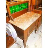 A Victorian tile back marble top washstand.