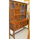 An early 20thC oak dresser.