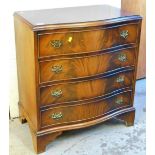 A serpentine mahogany chest, of four long cockbeaded drawers, with pierced plate back handles on bra