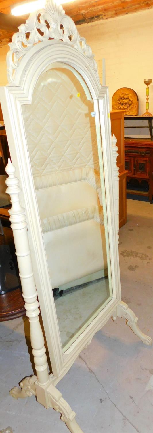 A painted cheval mirror, with shaped top.