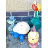 A garden ornament tortoise, ewer, rabbit and heron. (4)