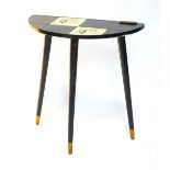 A Vintage 1950's black demi-lune telephone table, the top set with black tiles, together with