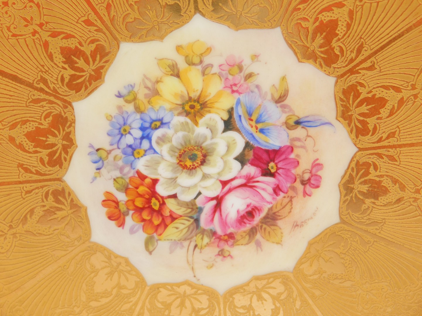 A Royal Worcester porcelain cabinet plate, circa 1958, painted by Freeman, with flowers, within a - Image 2 of 5