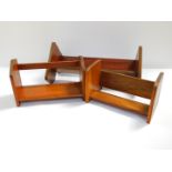 A mahogany book trough, 49cm W., walnut book trough, 30.5cm W., and a further book trough with