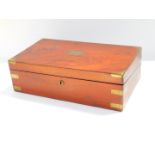 A Victorian mahogany and brass bound writing slope, opening to reveal a slope and fitted interior,